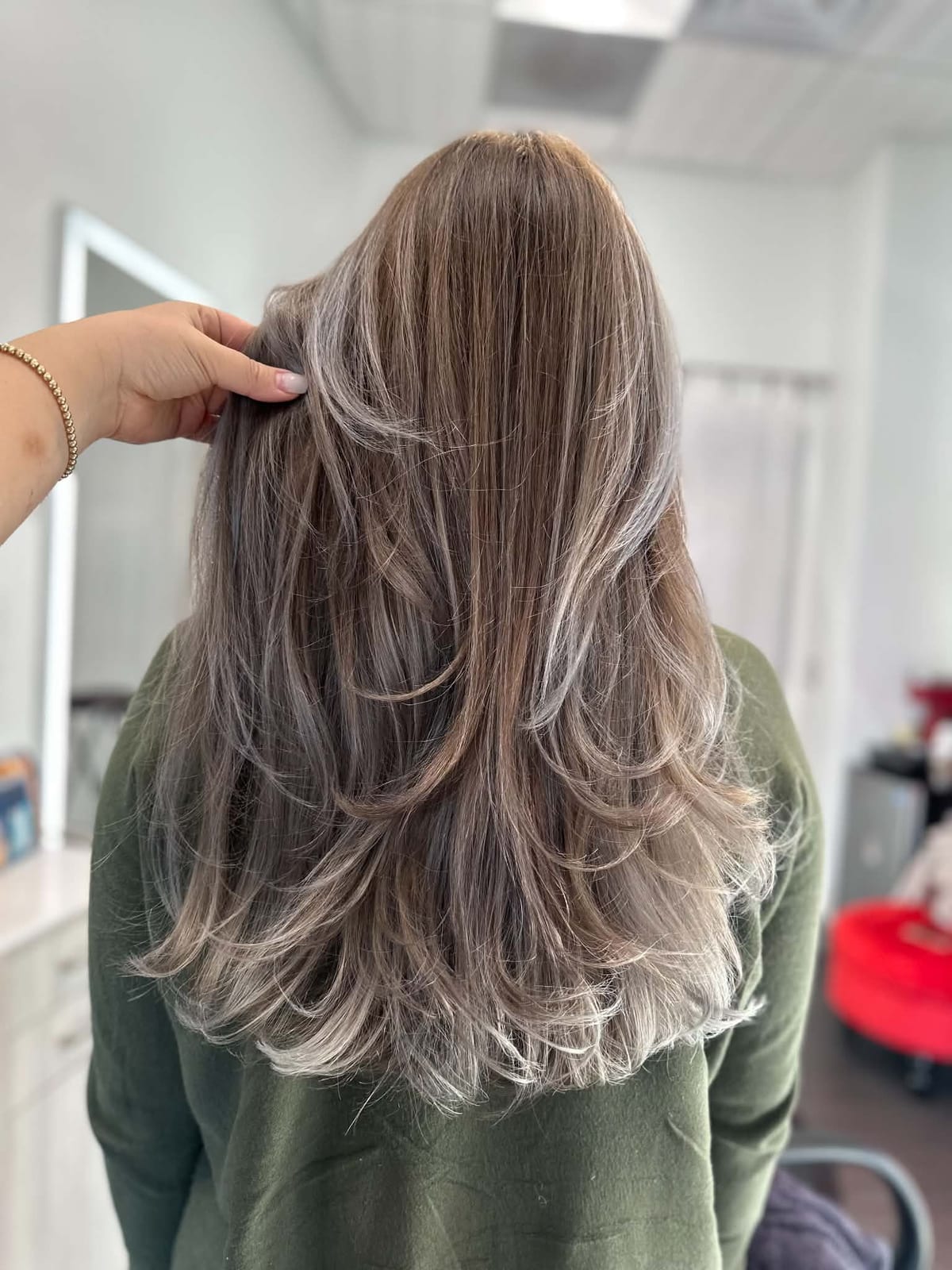 Long ash brunette hair with pale dimensional layers